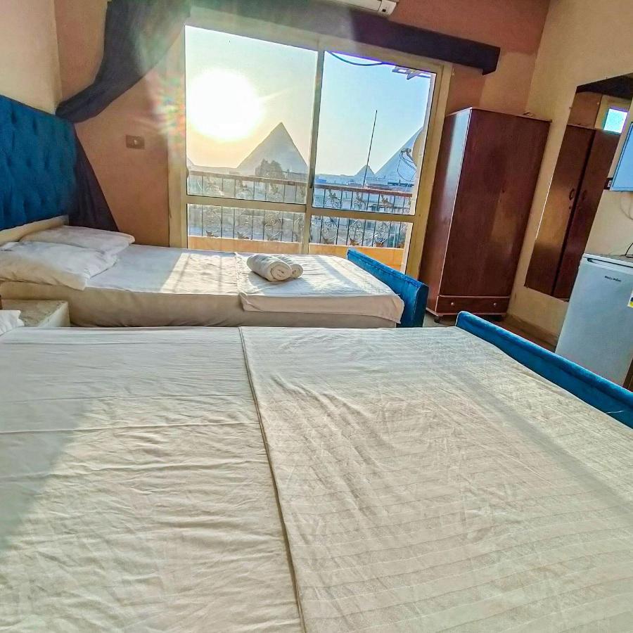 Happy days Pyramids Inn Kafrat al Jabal Bagian luar foto